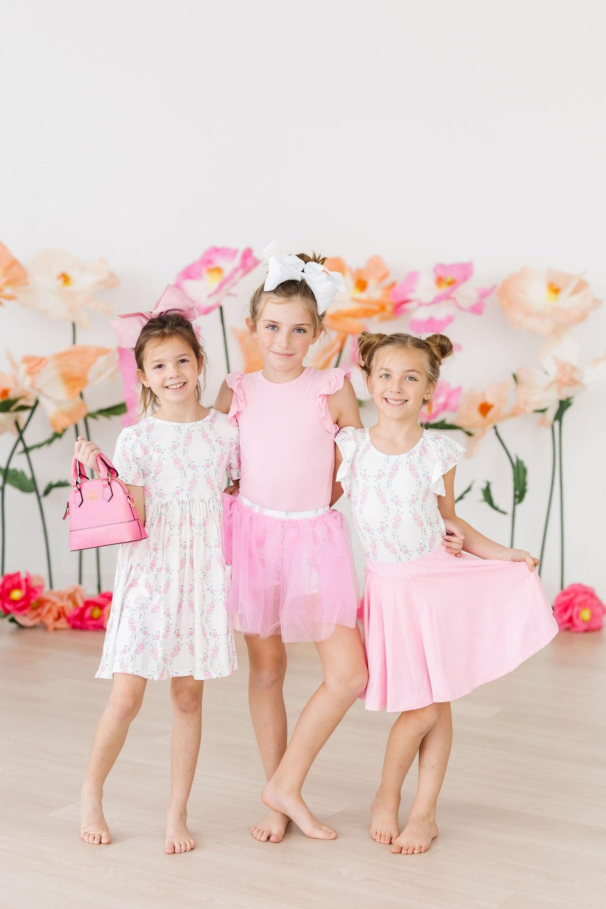 a group of girls posing for a picture