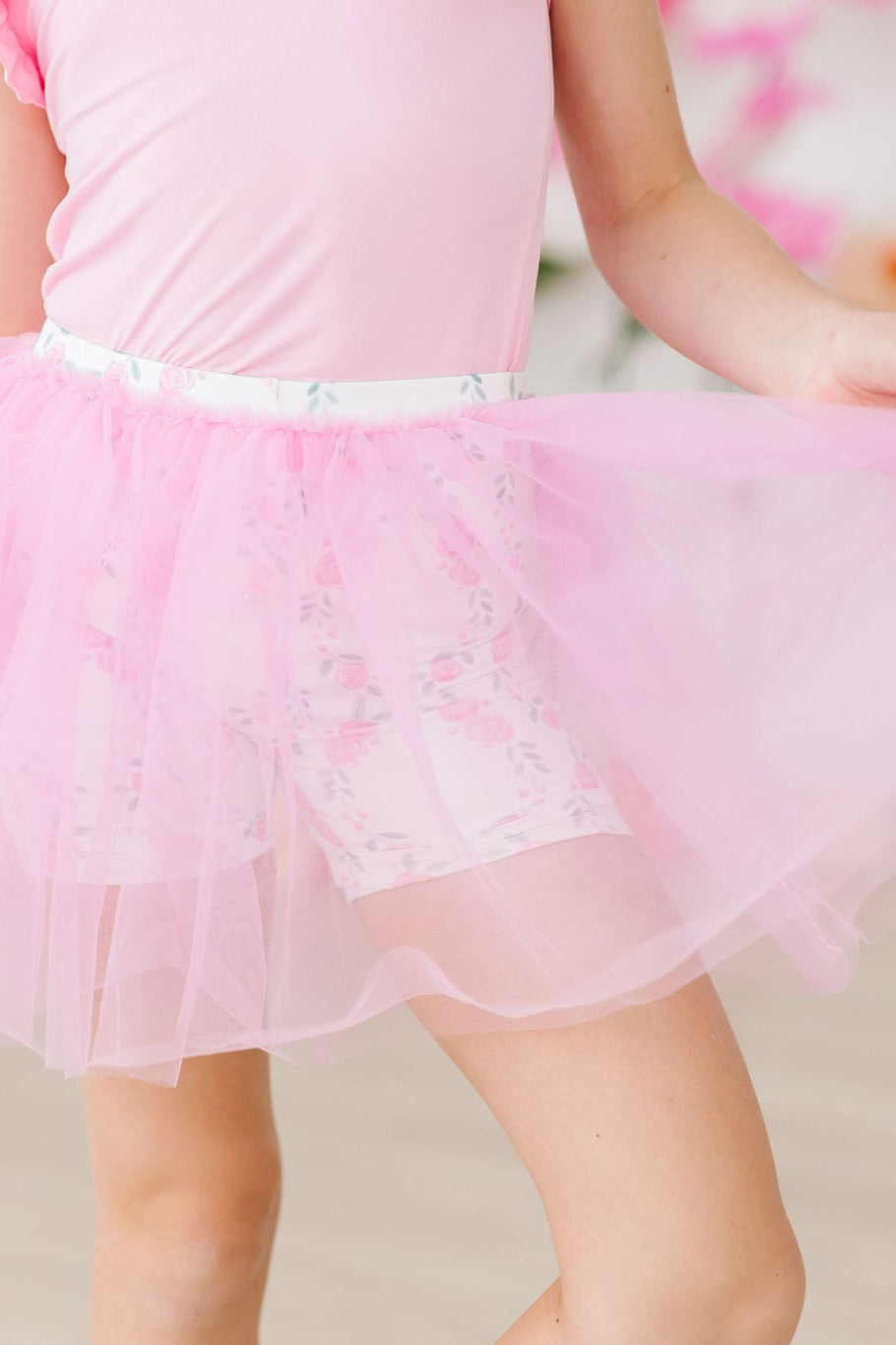 a person wearing a pink tutu