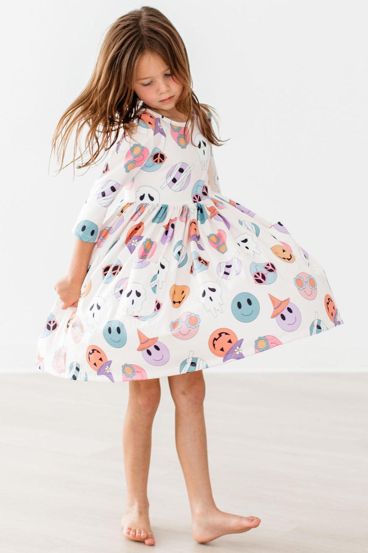 a girl in a dress