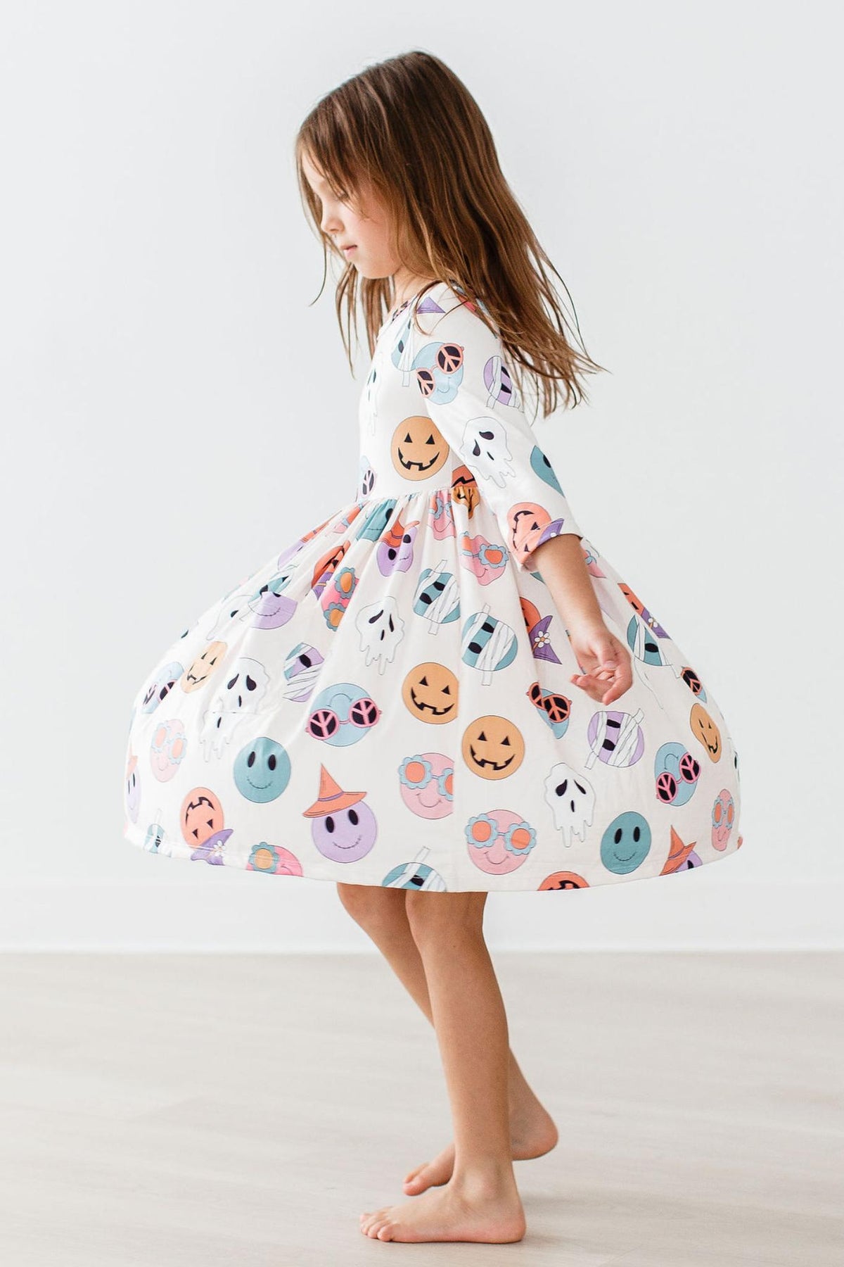a girl in a dress