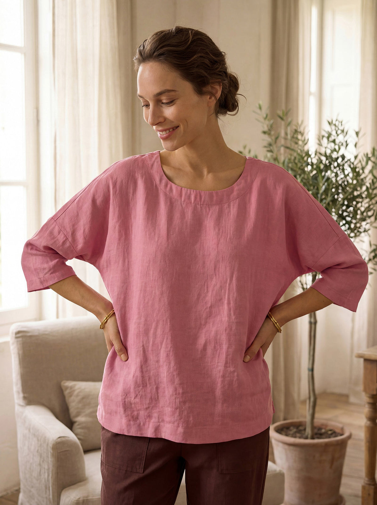a woman in a pink shirt