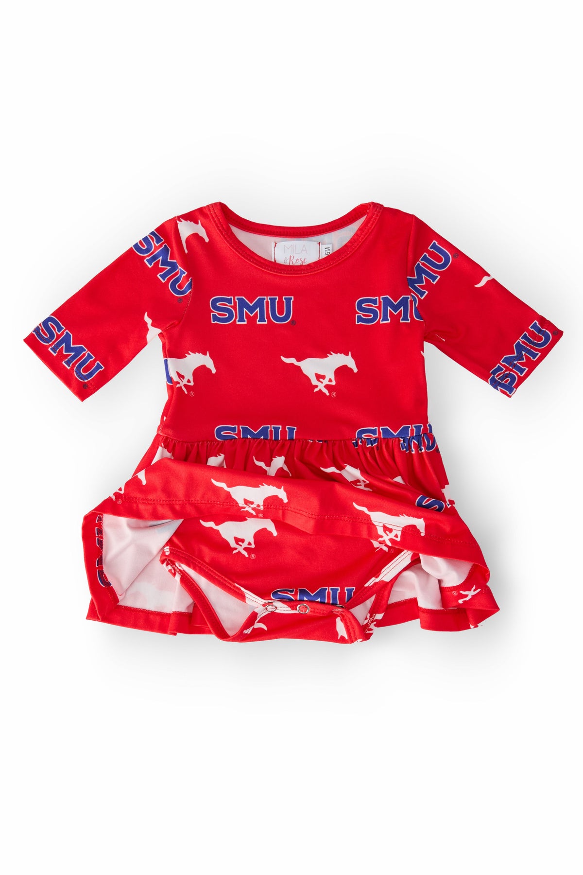 a red dress with white horses on it