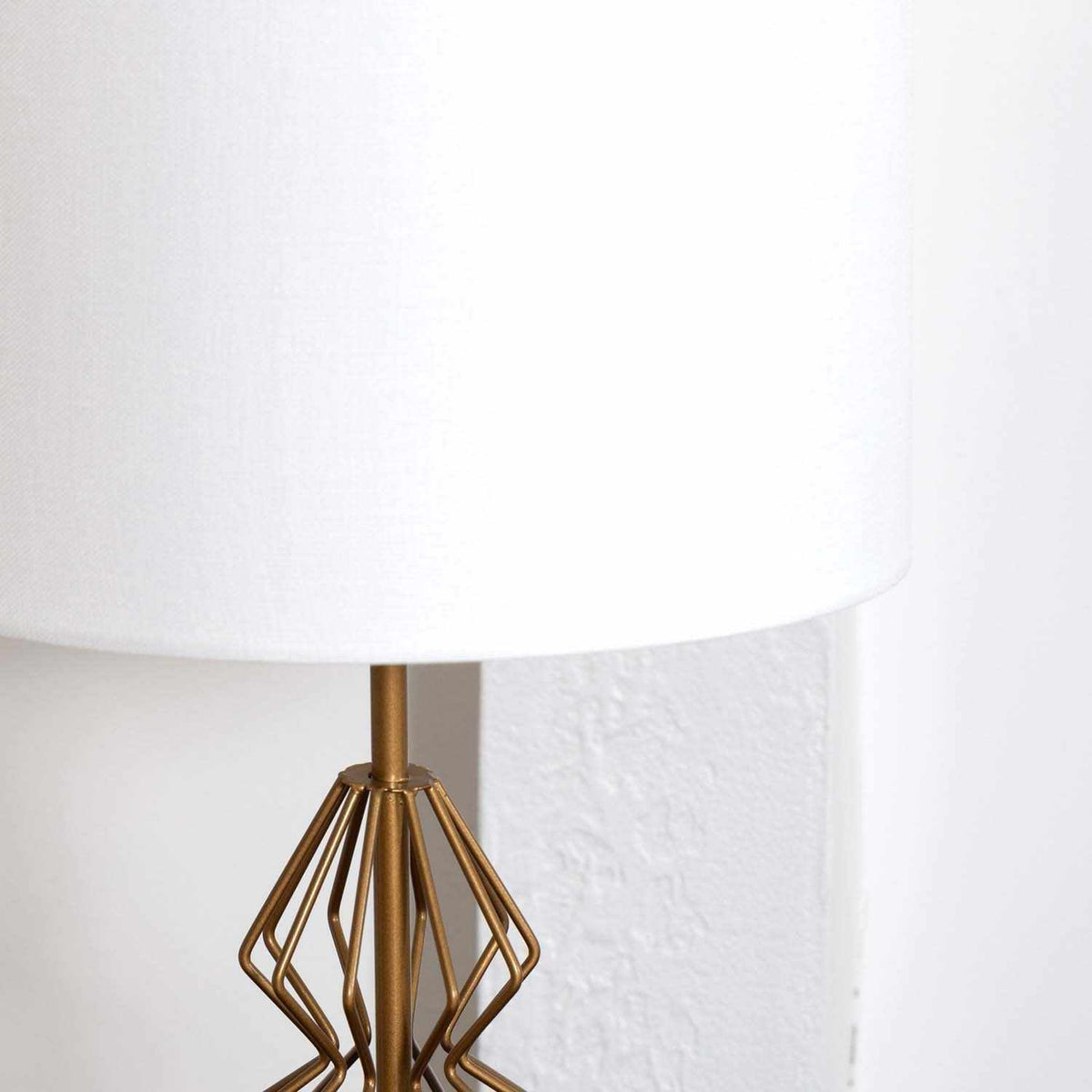 a lamp with a white shade