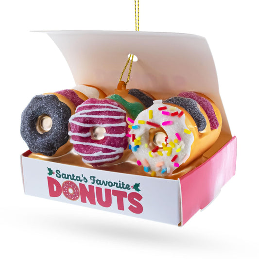 a box of doughnuts with sprinkles