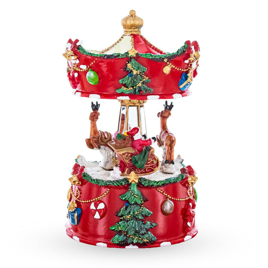 a carousel with reindeers and trees