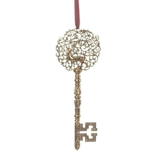 a gold key on a red ribbon