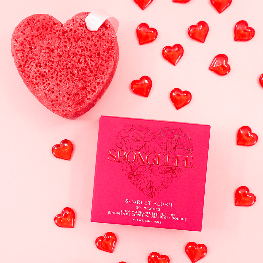 a red heart shaped object next to red hearts
