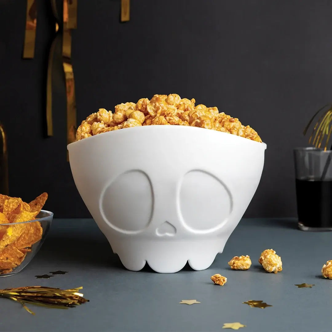 a bowl of popcorn and chips