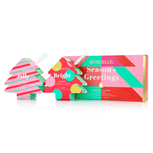 a box with a couple of small christmas trees