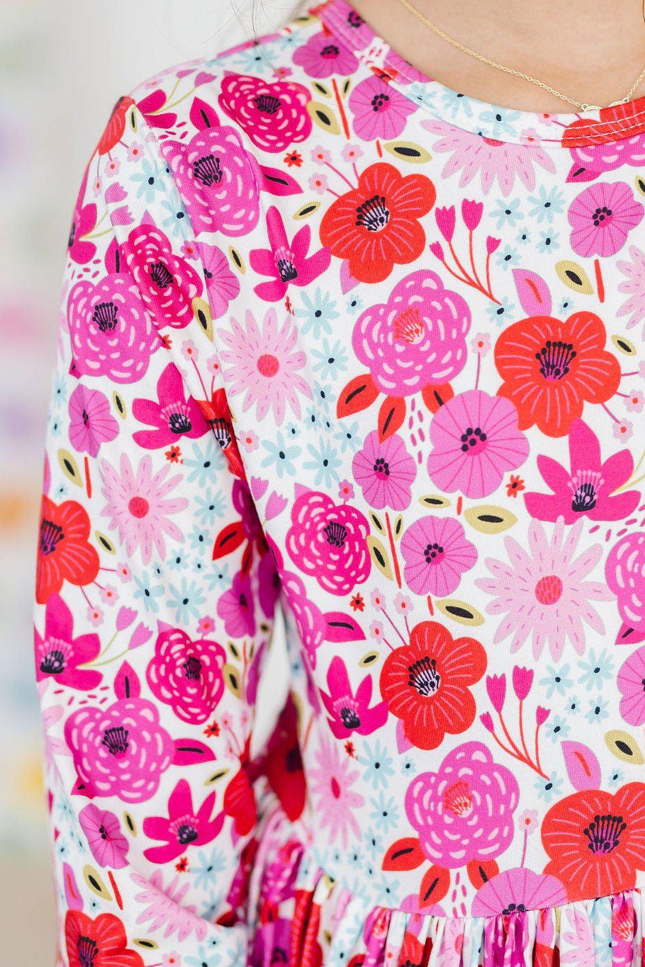a person wearing a floral shirt