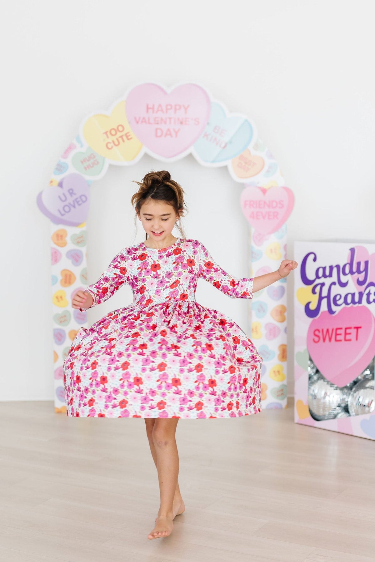 a girl dancing in a dress
