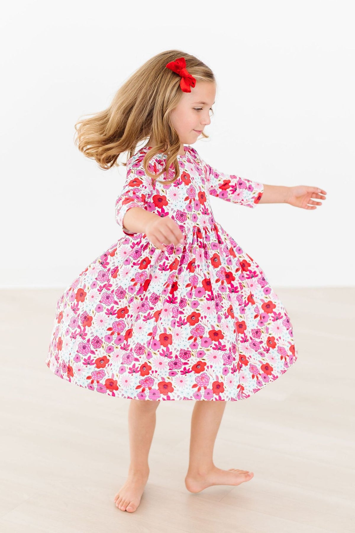 a girl in a dress dancing