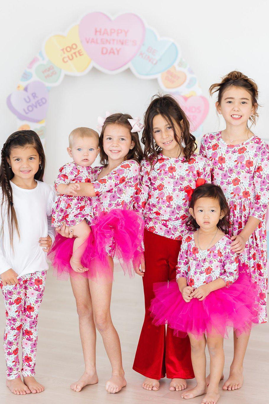 a group of girls posing for a photo