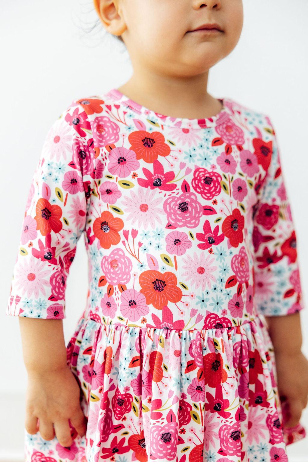 a child wearing a dress