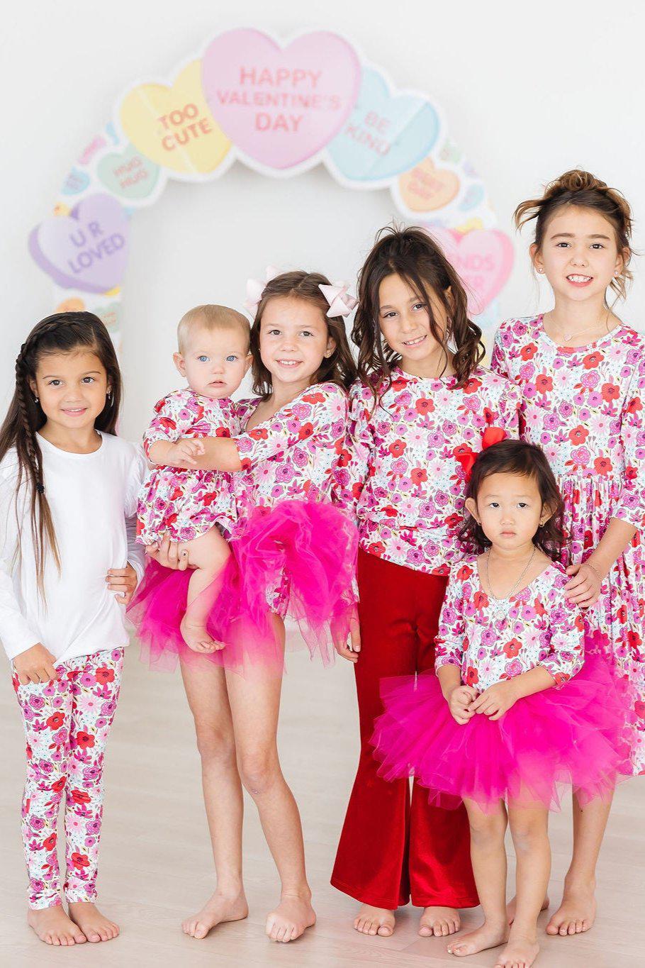 a group of girls posing for a picture