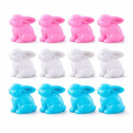 a group of pink and white rabbits