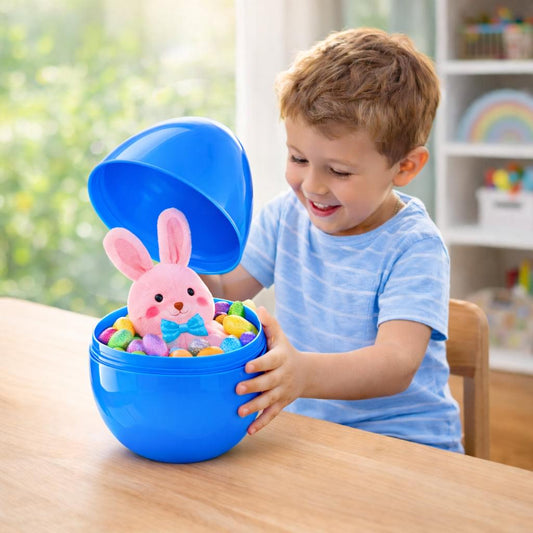 a boy holding a stuffed bunny in a blue bowl