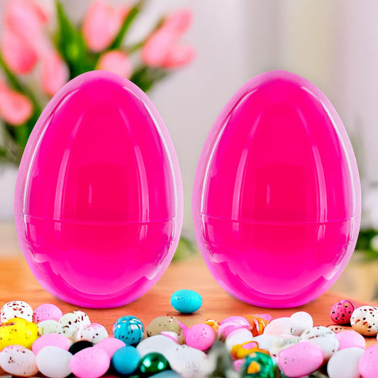 two plastic eggs on a table