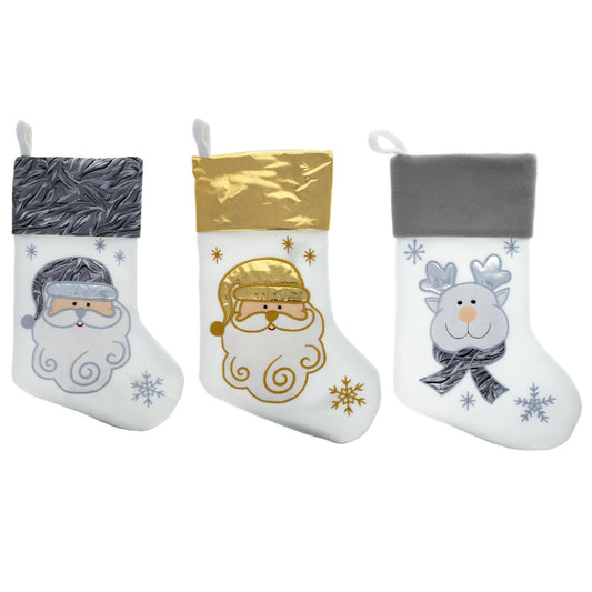 a group of white and gold christmas stockings