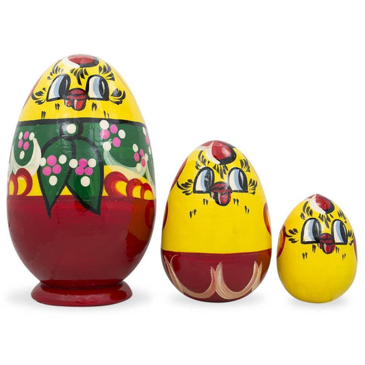 a group of eggs with painted faces