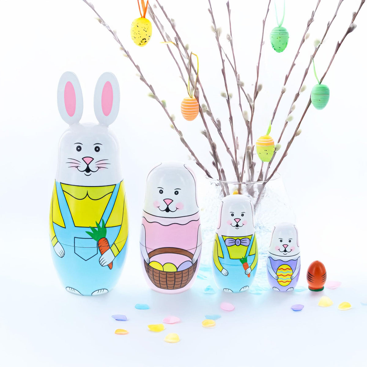 a group of easter eggs and bunny dolls