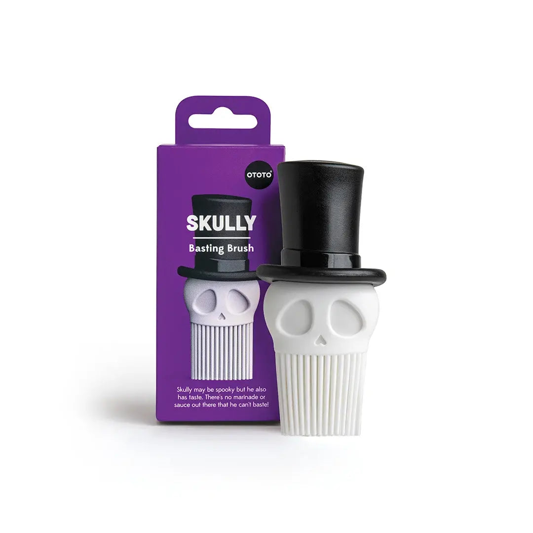 a white skull with a black top hat