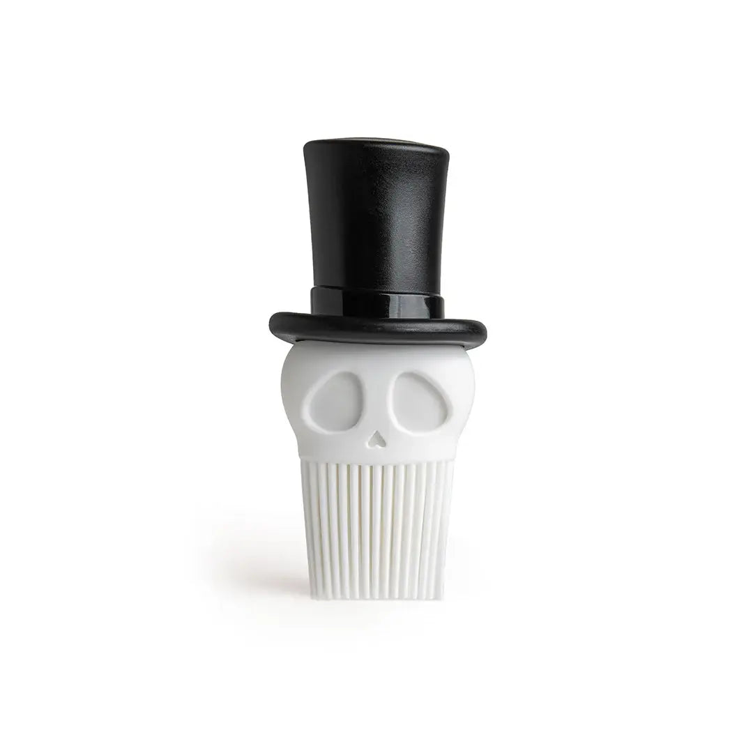 a white skull with a black top hat