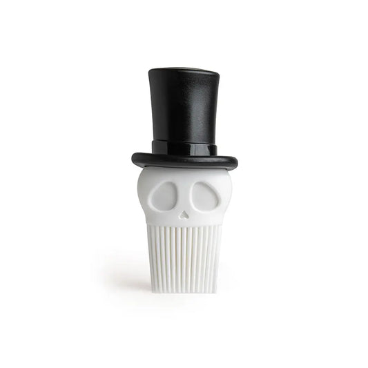 a white skull with a black top hat