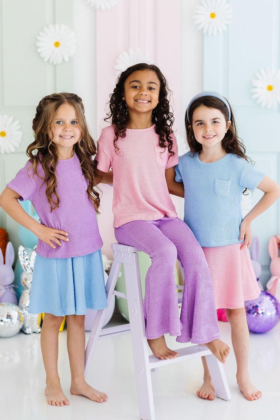 a group of girls posing for a picture
