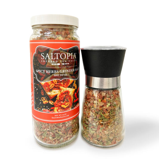 a jar of spices and a pepper mill