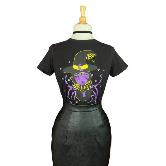 a black dress with a purple spider on it