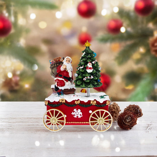 a christmas tree and santa on a train