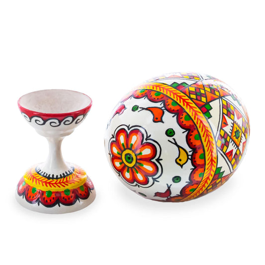 a colorful painted ball and cup