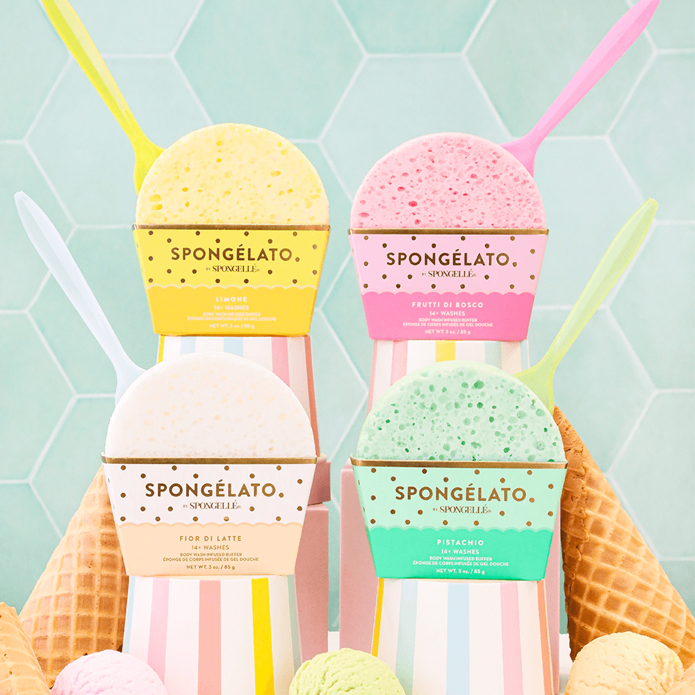 a group of ice cream containers with spoons