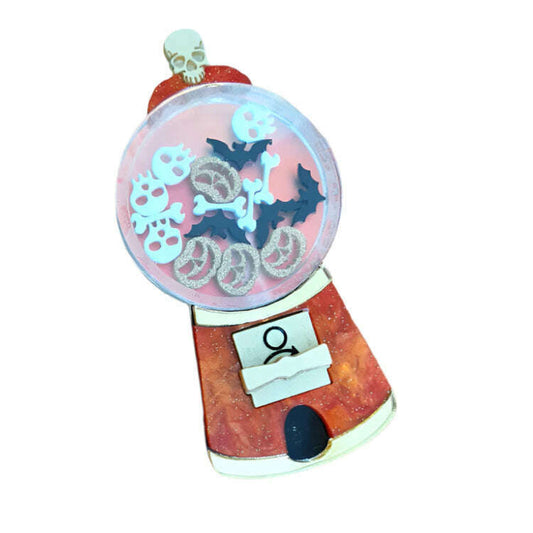 a candy machine with bones and bones inside