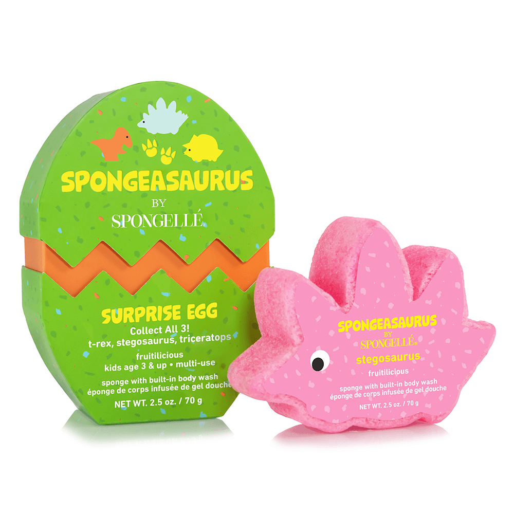 a pink dinosaur in a green egg shaped box