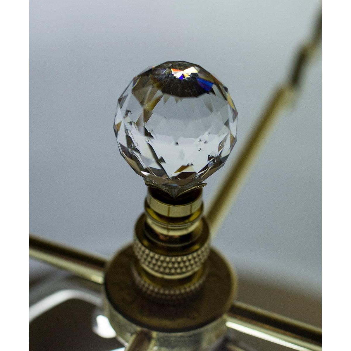 a crystal ball on a lamp
