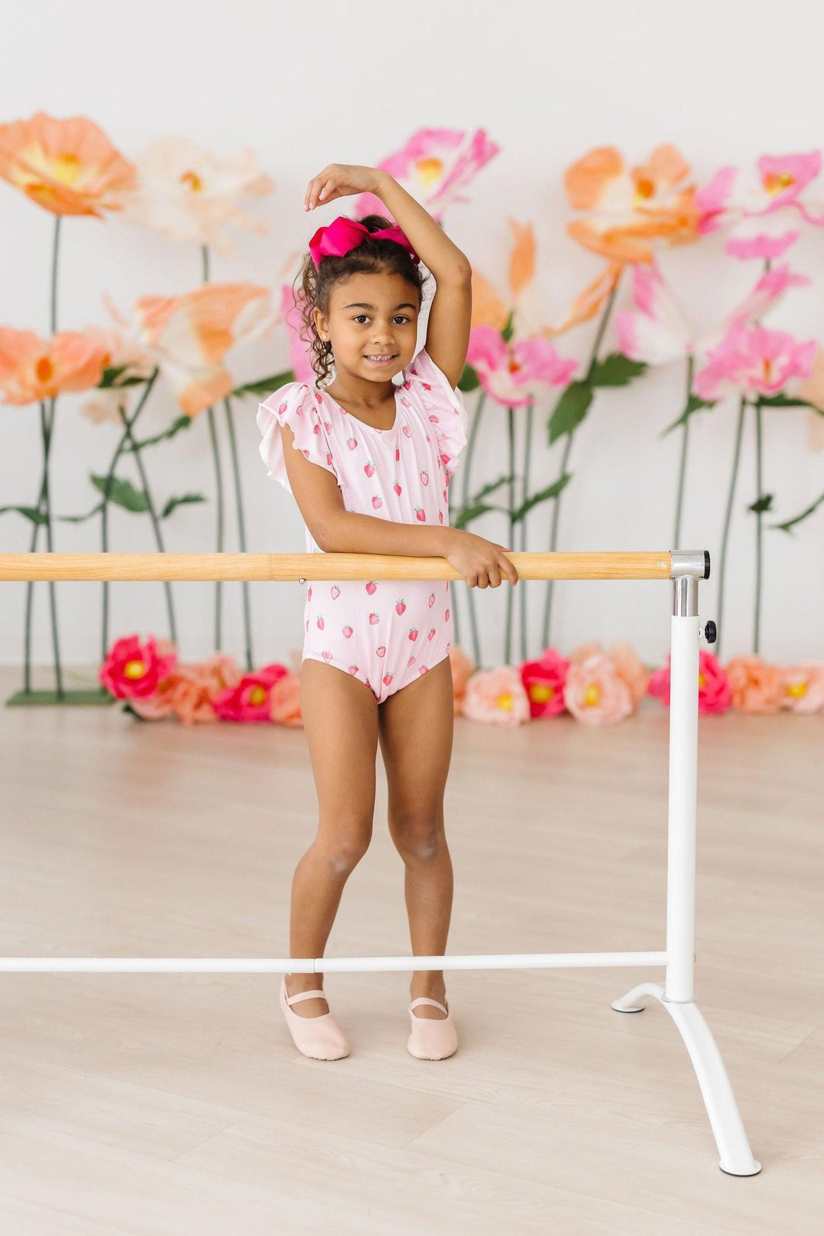 a girl standing on a bar