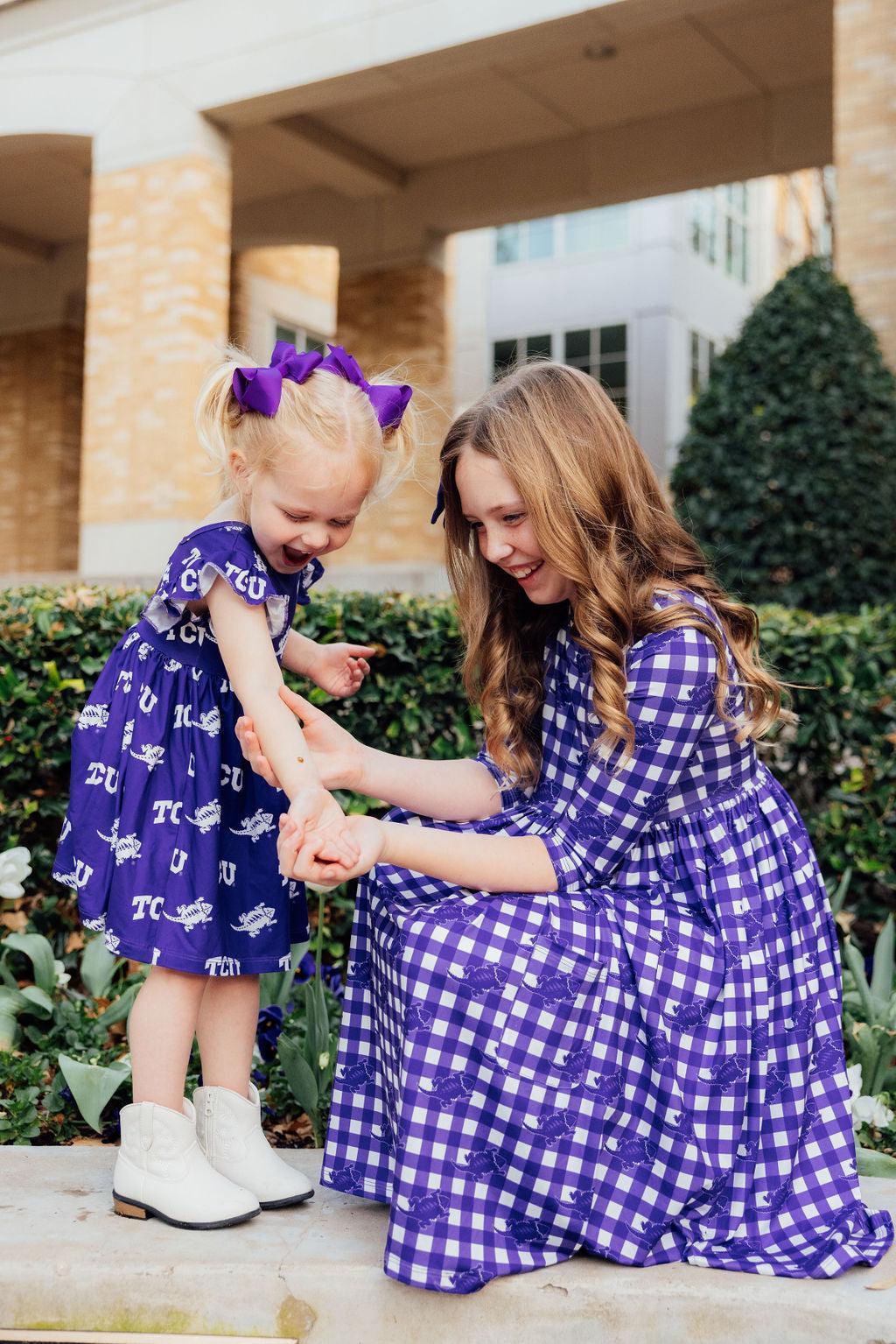 a woman and a child playing with each other