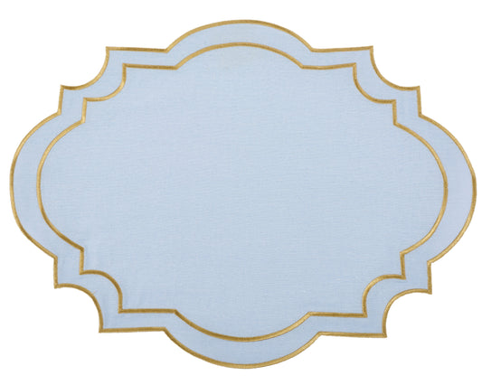 a white and gold place mat