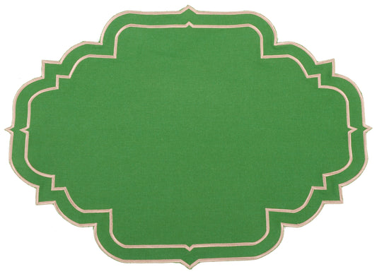 a green area rug with a pink border