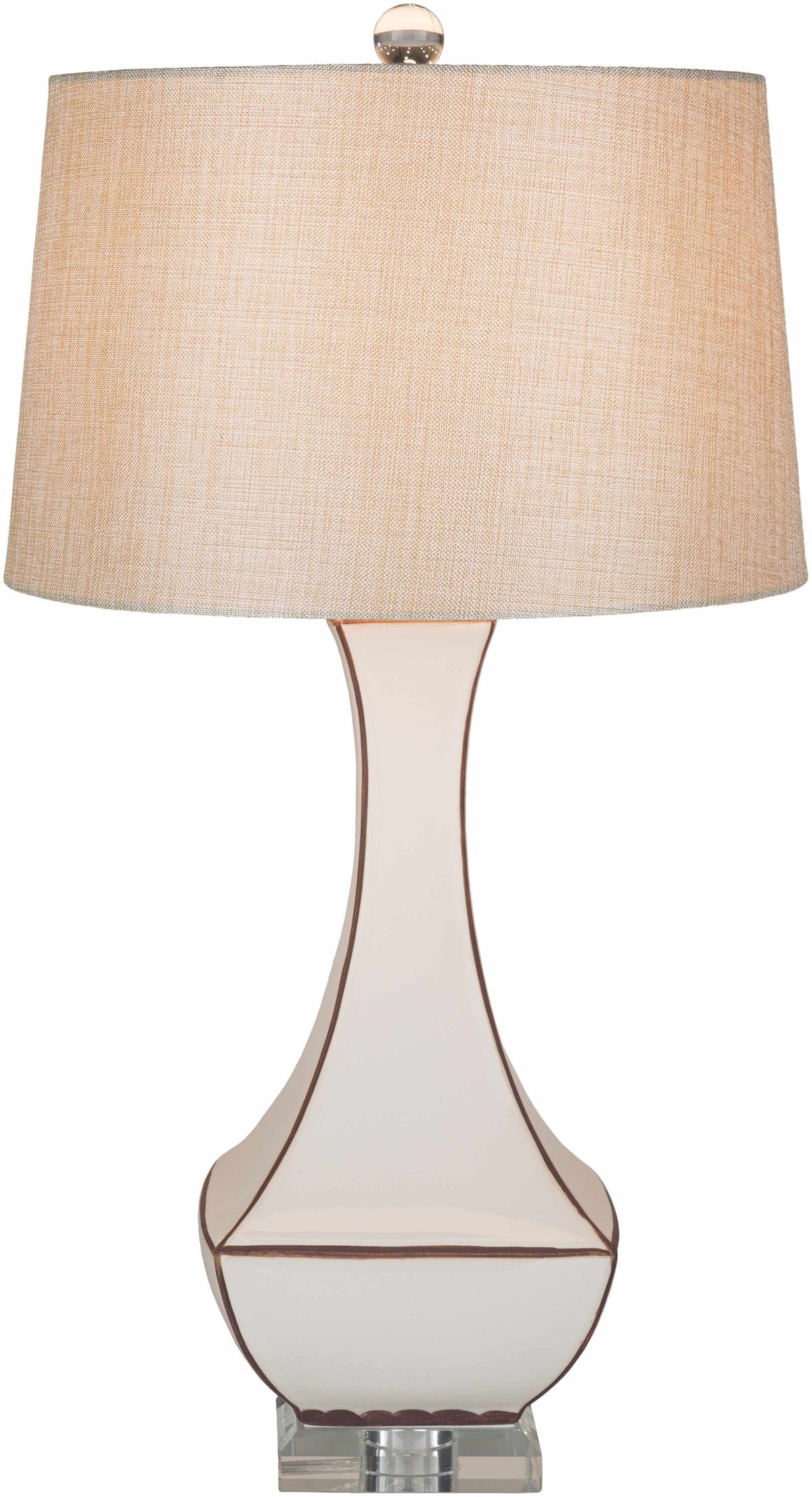 a white lamp with a brown shade