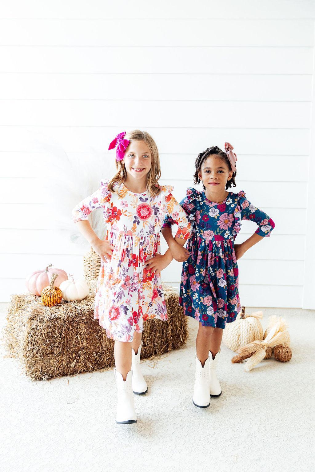 two girls posing for a picture