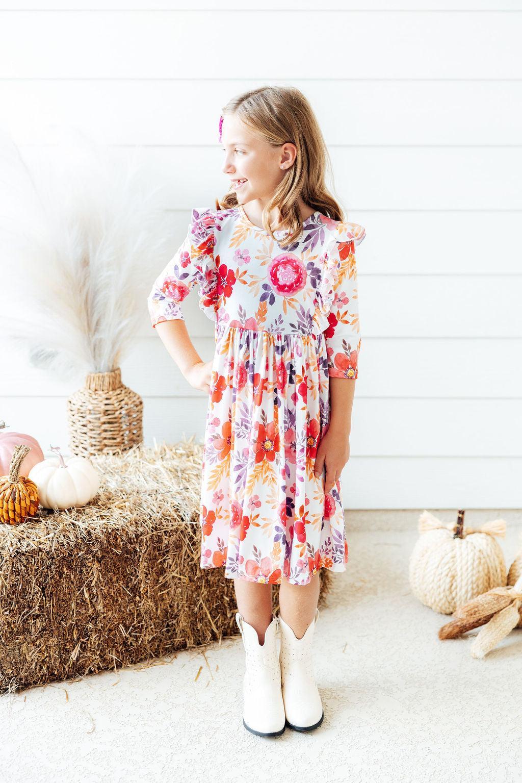 a girl in a dress