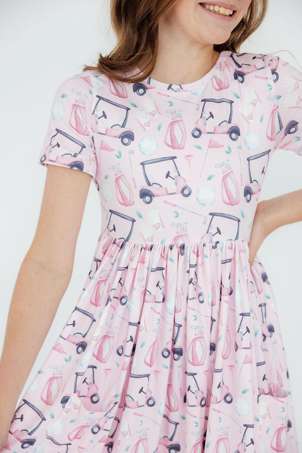a girl wearing a dress