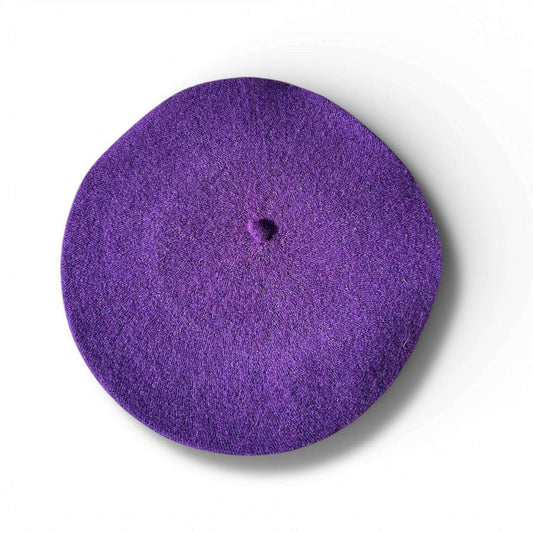 a purple hat on a white background
