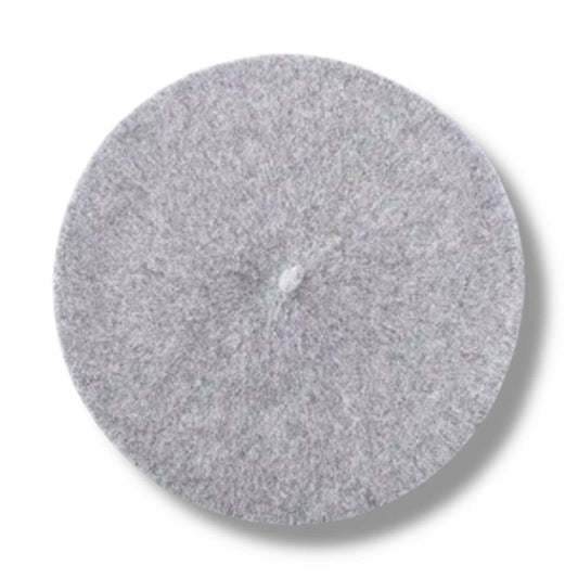 a grey hat with a white button