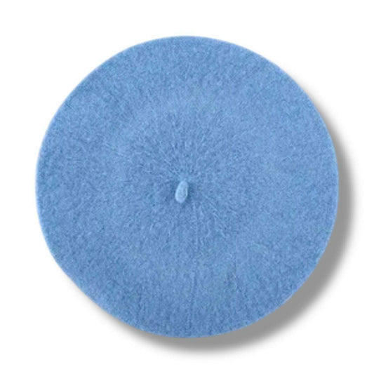 a blue beret with a small needle