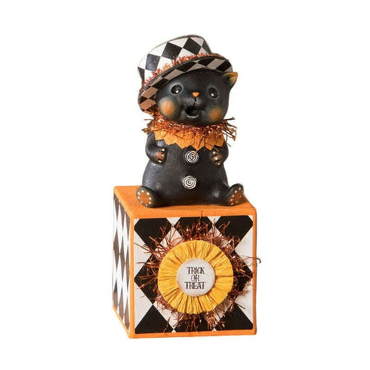 a black and orange box with a cat statue