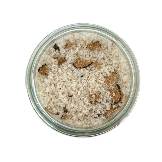 a bowl of salt with brown specks